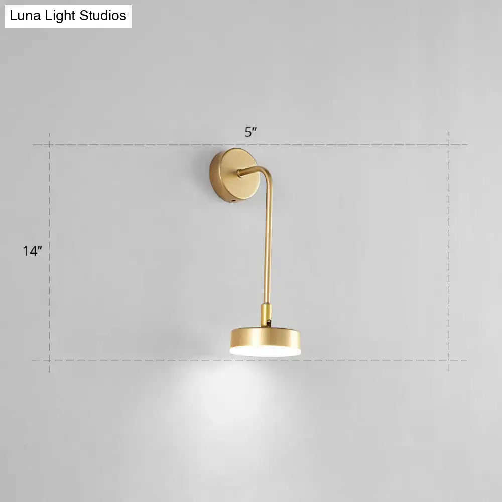 Minimalist gold metal led sconce with slender curved arm and circular base wall mounted lamp for bedroom use
