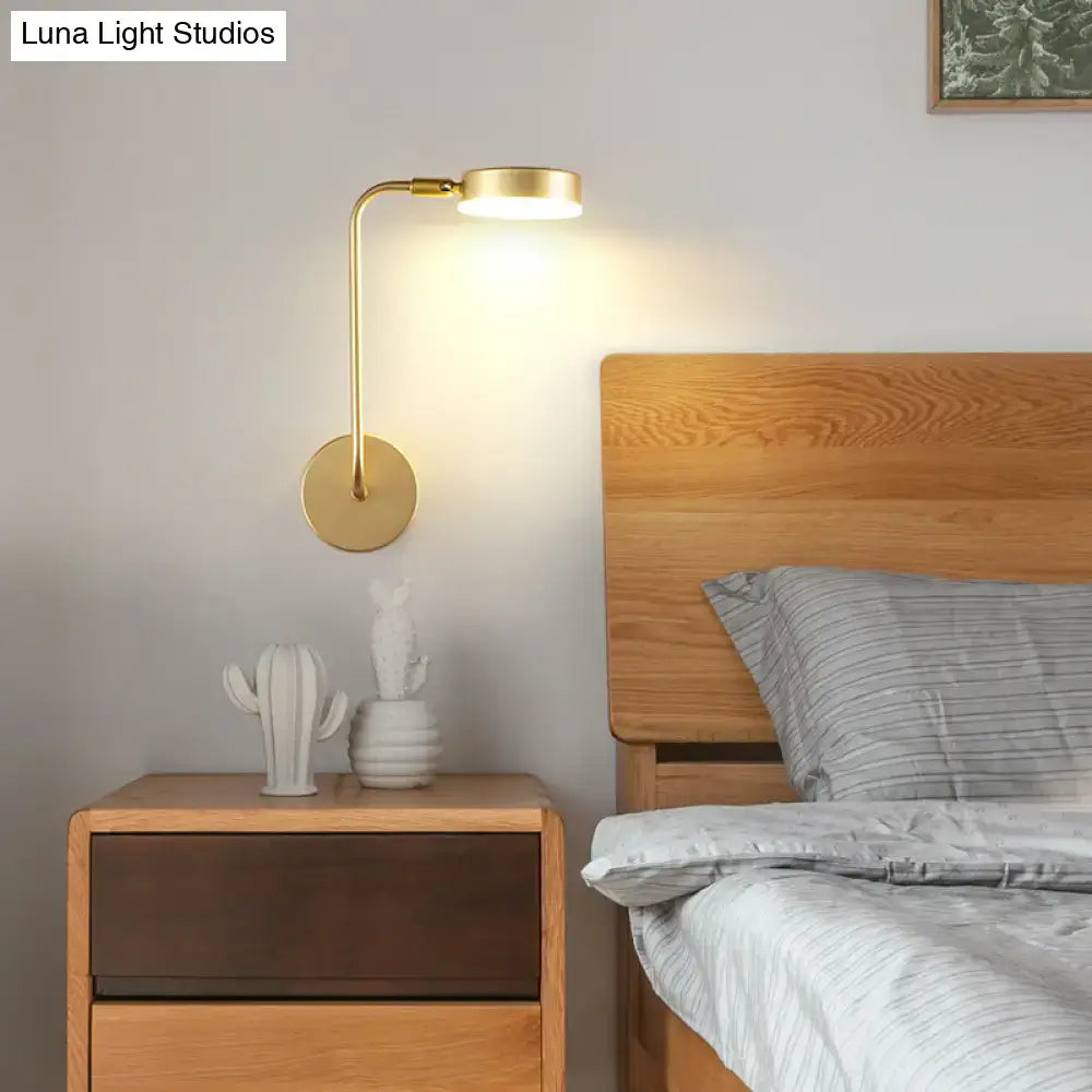 Minimalist gold metal led sconce wall mounted lamp with curved arm and circular base for bedroom lighting