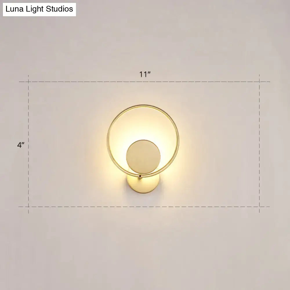Minimalist gold metal led sconce wall mounted lamp with circular design and frosted glass diffuser for bedroom