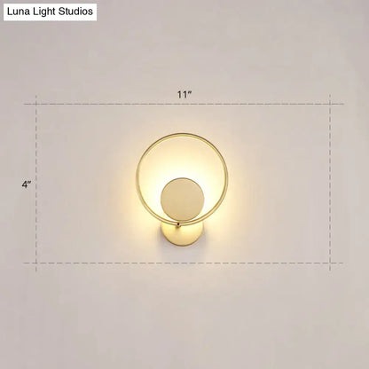 Minimalist gold metal led sconce wall mounted lamp with circular design and frosted glass diffuser for bedroom