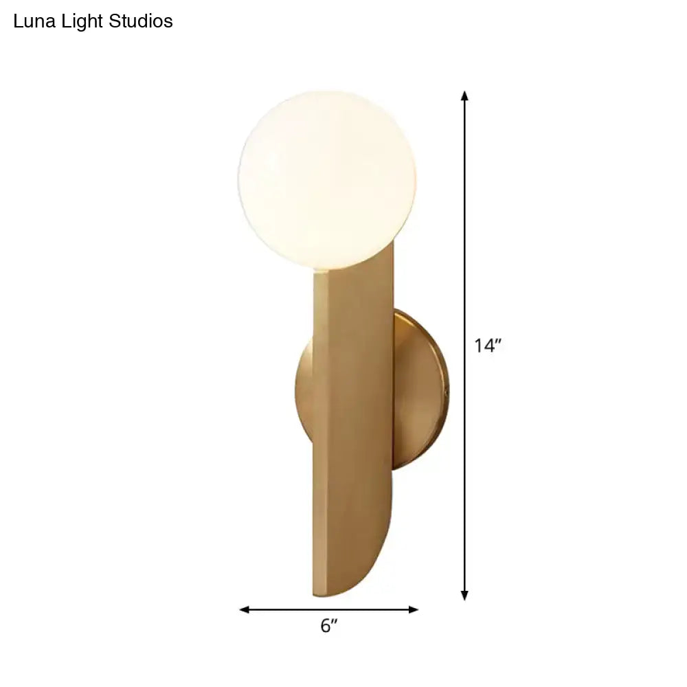 Minimalist gold mini globe wall sconce with frosted glass globe and sleek design for bedroom lighting