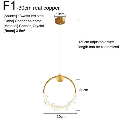 A modern copper minimalist gold nordic pendant light with circular frame and crystal accents for kitchen decorbites gold nordic decor