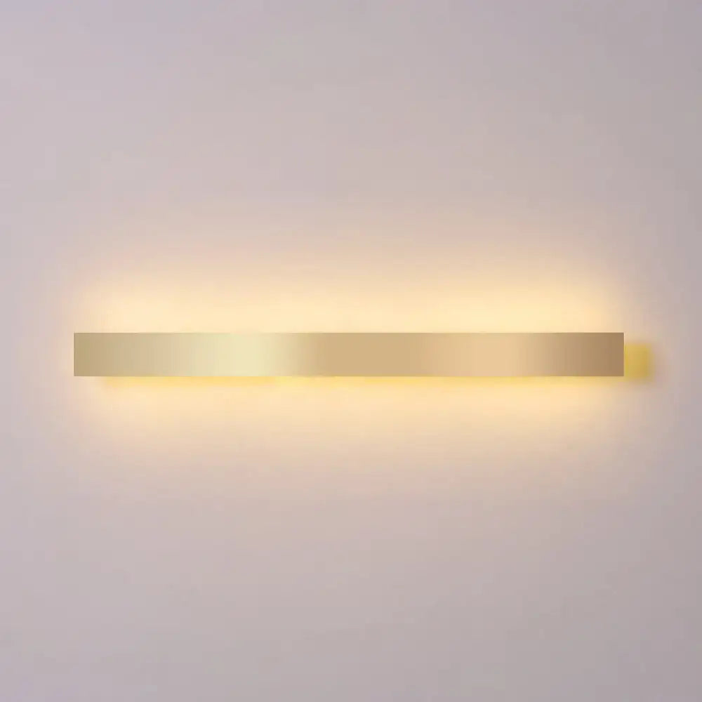 Modern minimalist gold plated led wall sconce with a sleek rectangular design for living room or bar lighting
