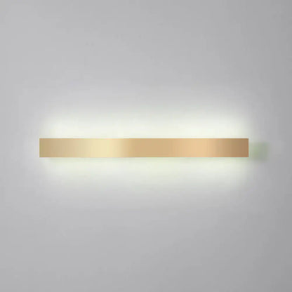 A sleek rectangular minimalist gold plated led wall sconce with modern design for living room or bar lighting