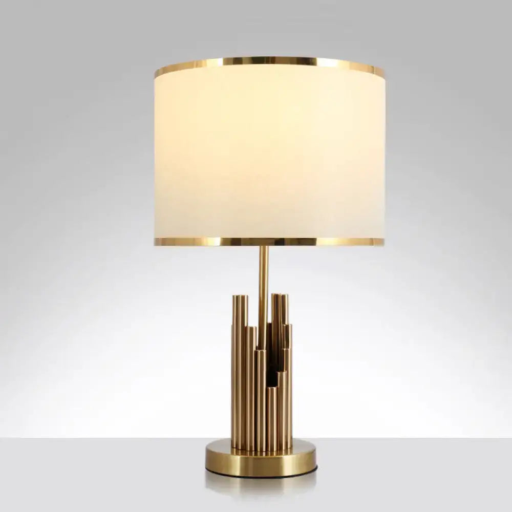 Decorbites minimalist table lamp with gold finish and cream fabric shade features vertical metal rods suitable for led incandescent lighting