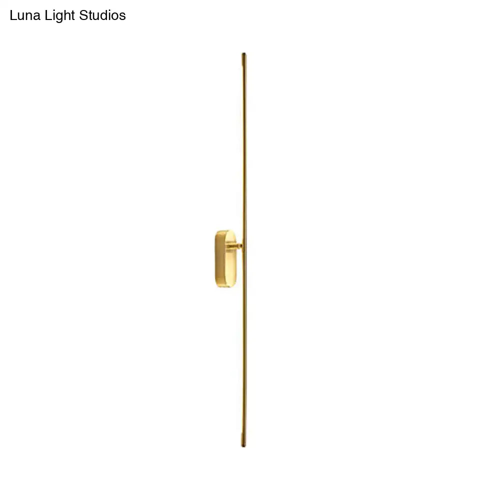 Minimalist gold vertical rod wall lamp offers a sleek rectangular light fixture perfect for living room decor