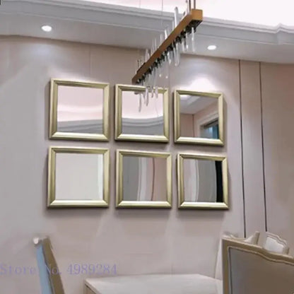 Set of six minimalist square mirrors with golden border frames arranged as wall decor for living room use