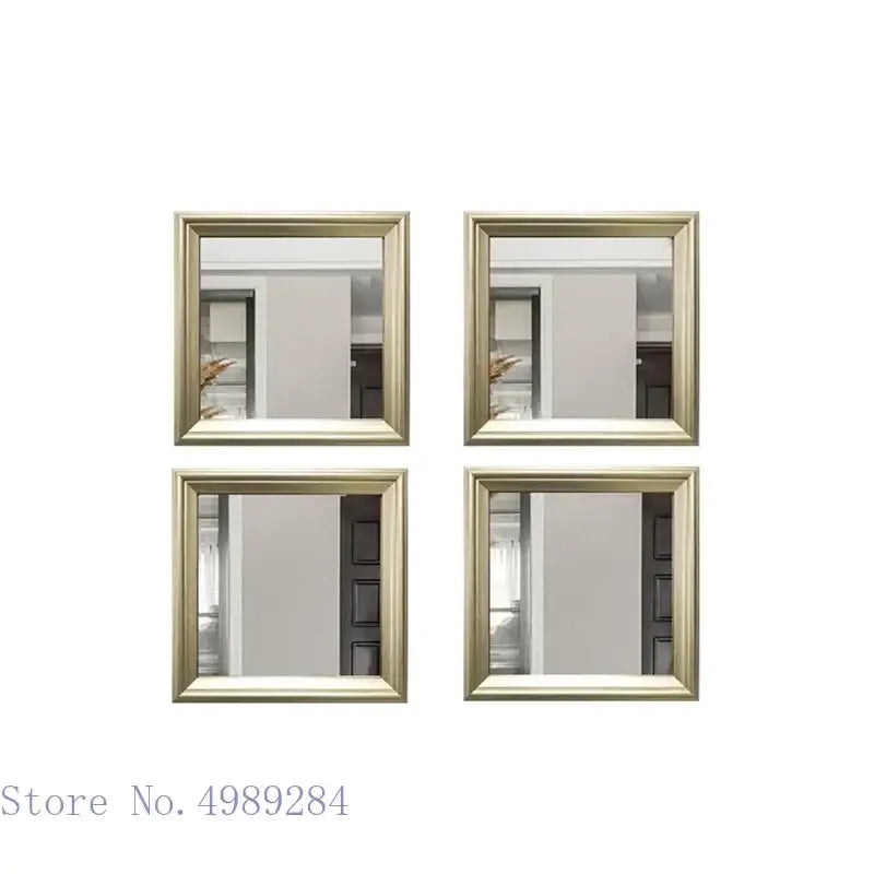 Set of four square mirrors with elegant golden border frames for minimalist mirror wall decor in living room
