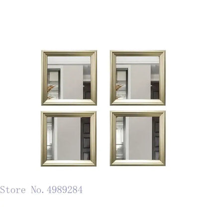 Set of four square mirrors with elegant golden border frames for minimalist mirror wall decor in living room