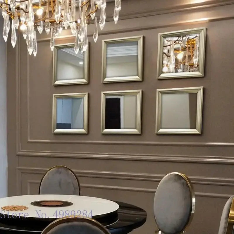 Minimalist wall decor with six square mirrors featuring metallic silver frames arranged in a two by three grid