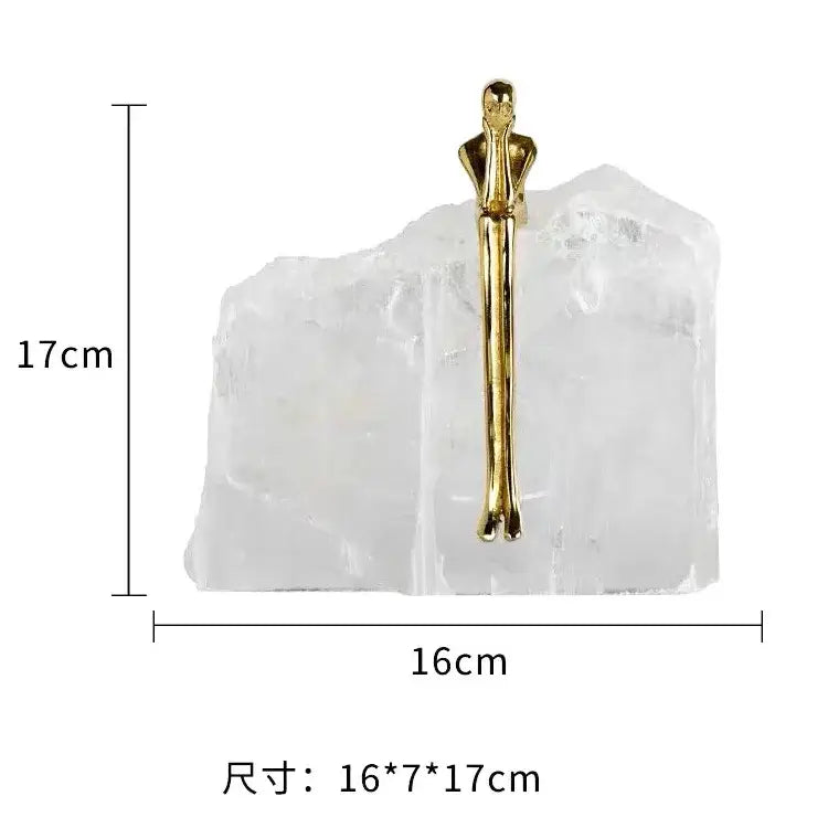 Minimalist golden man sculpture bookend in gold tone on a translucent crystal base for stylish home decor decorbites golden man