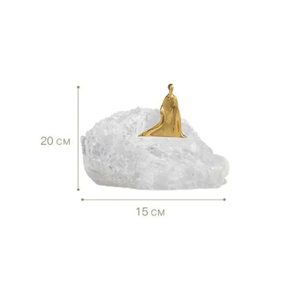 Minimalist golden man sculpture bookends featuring a golden man figurine on crystalline rock for home decor by decorbites