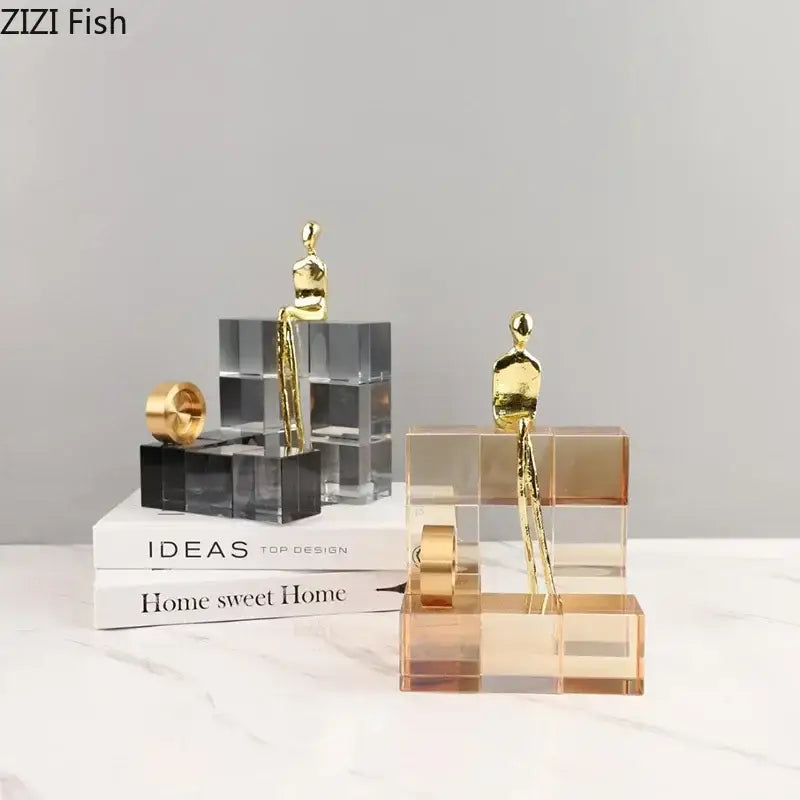 Minimalist golden thinker crystal base sculpture with gold-toned abstract figurines on colored acrylic cubes for office decorbites decor