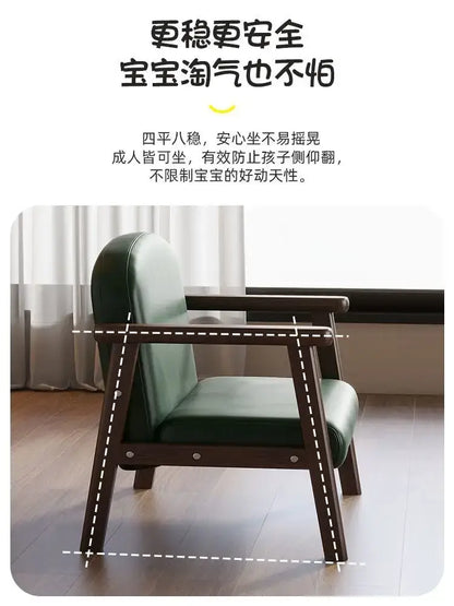 Minimalist kids wooden chair with dark wood frame and plush green leather upholstery for kids bedroom set