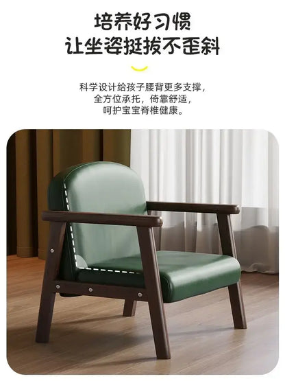 Minimalist kids wooden chair with dark wood frame and green leather upholstered seat and backrest for bedroom use