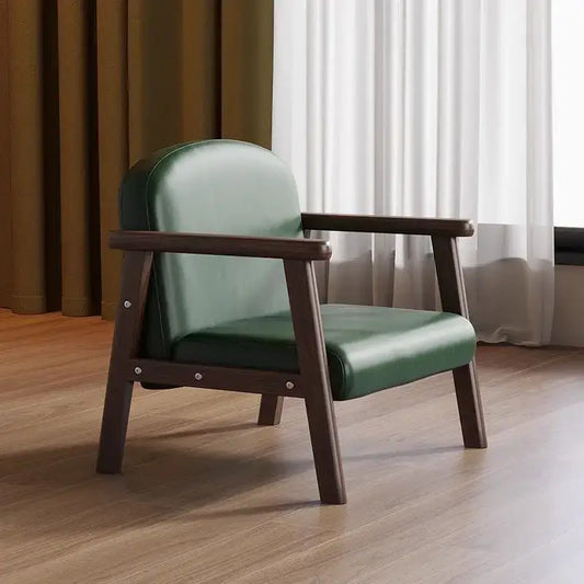 A sleek green leather kids wooden chair with dark wood frame and minimalist design for kids bedroom set