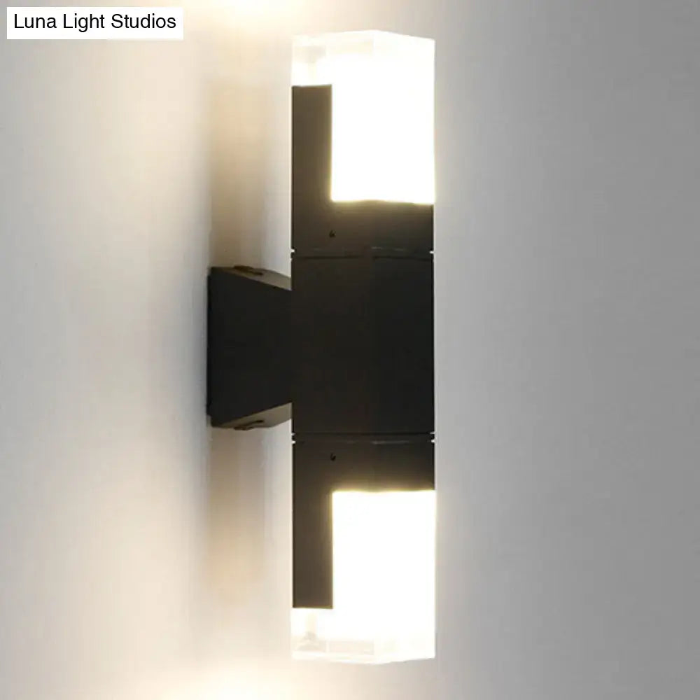 Minimalist led black wall lamp with two illuminated rectangular panels in warm white for courtyard lighting