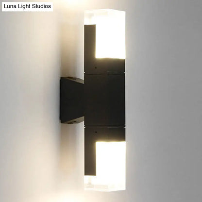 Minimalist led black wall lamp with two illuminated rectangular panels in warm white for courtyard lighting