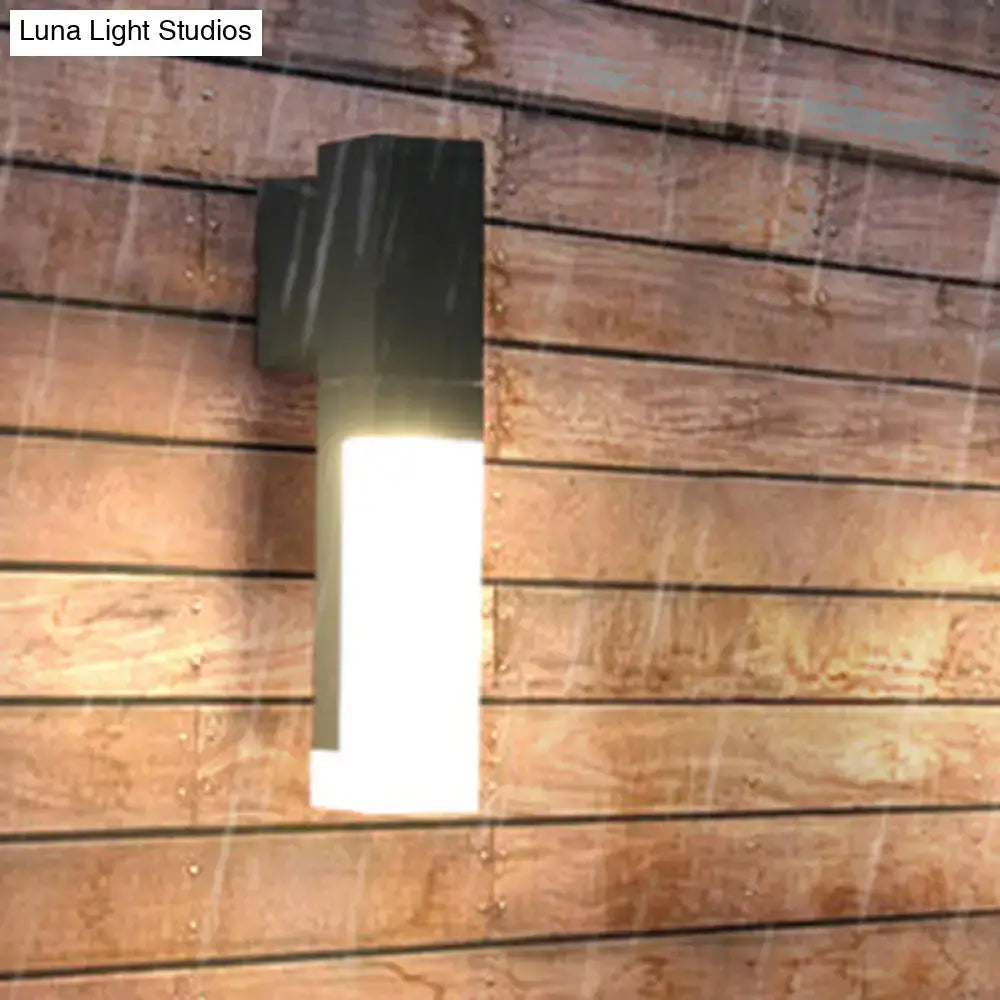 Modern black minimalist led wall lamp with sleek rectangular design and warm white light for outdoor courtyard use