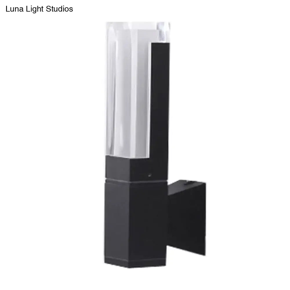 Modern black minimalist led wall lamp with clear faceted acrylic diffuser and warm white light for outdoor use