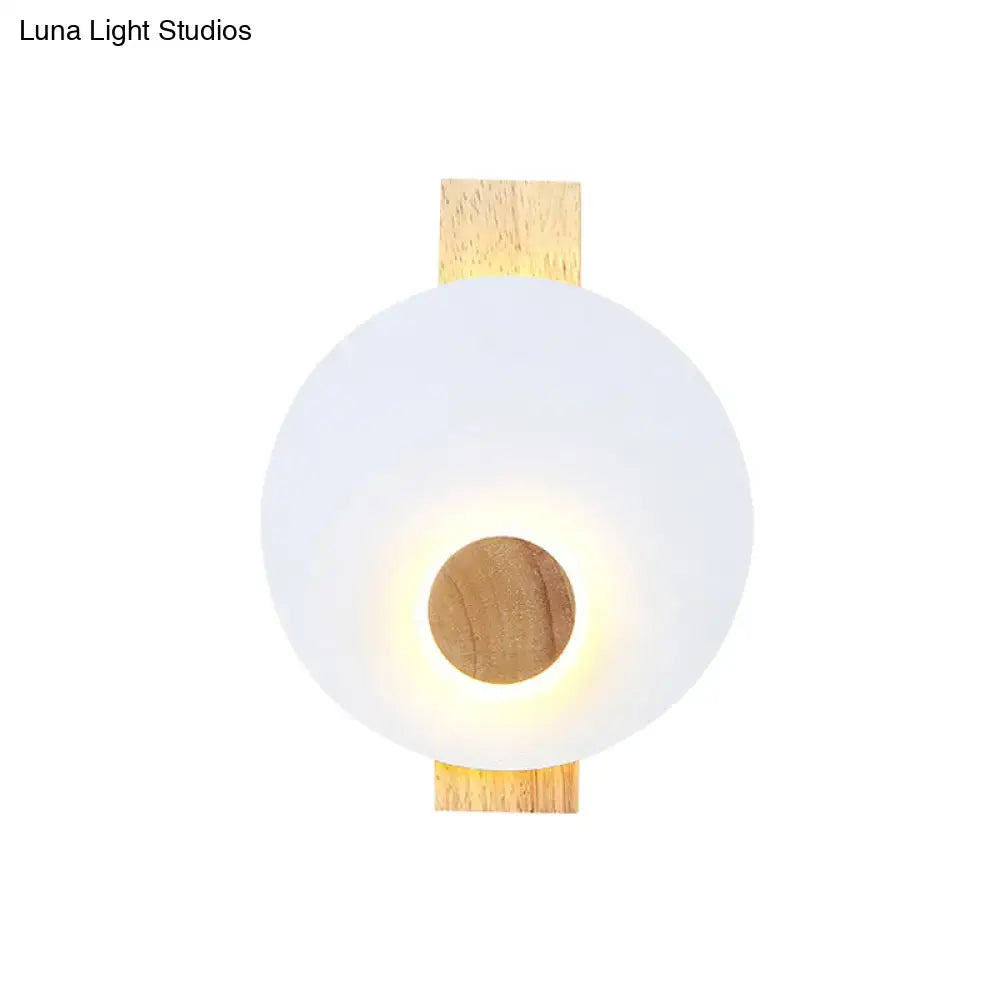Minimalist led gray metal disk wall sconce with frosted white glass shade and natural wood detail for 110v-120v use