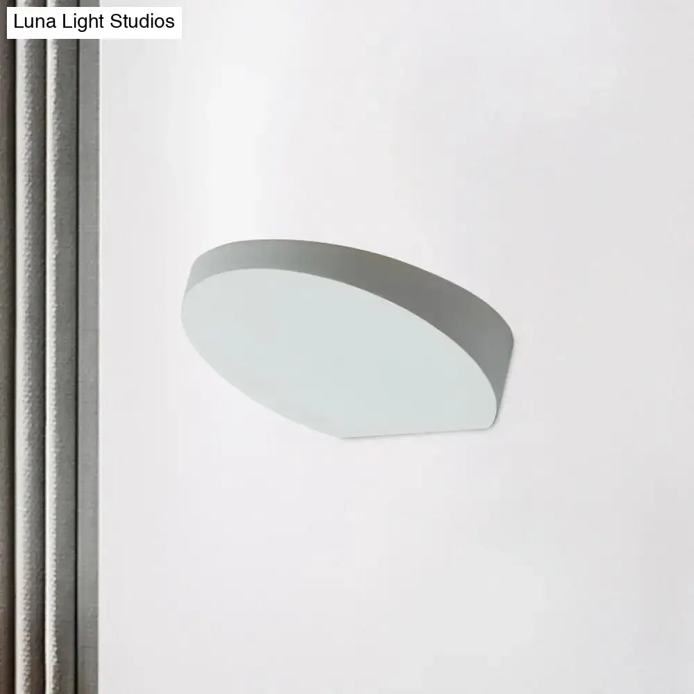 Minimalist led oval wall sconce with a sleek curved design and matte gray aluminum finish for corridor lighting
