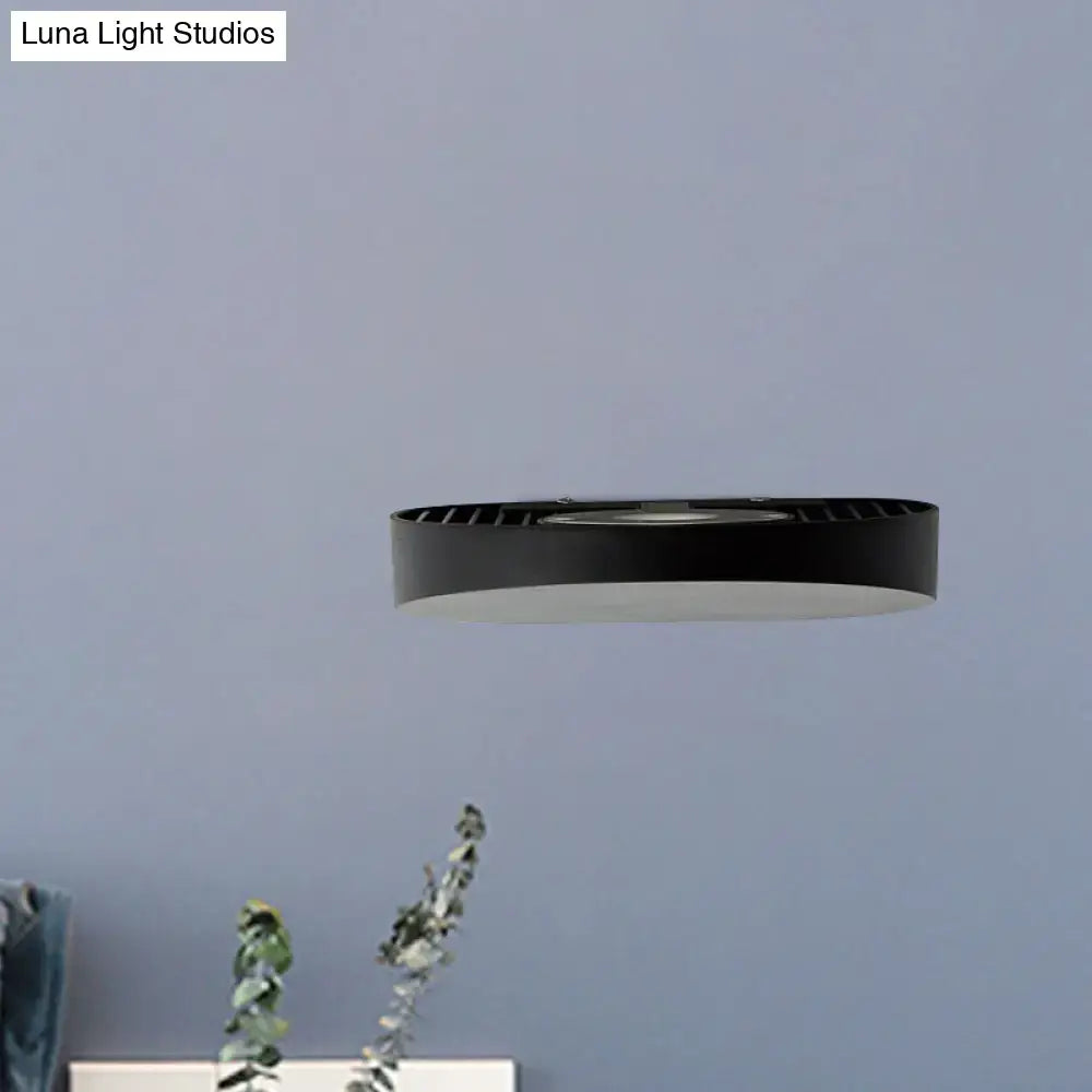 Black circular ceiling light with minimalist led design matte grey aluminum finish ideal for corridor illumination