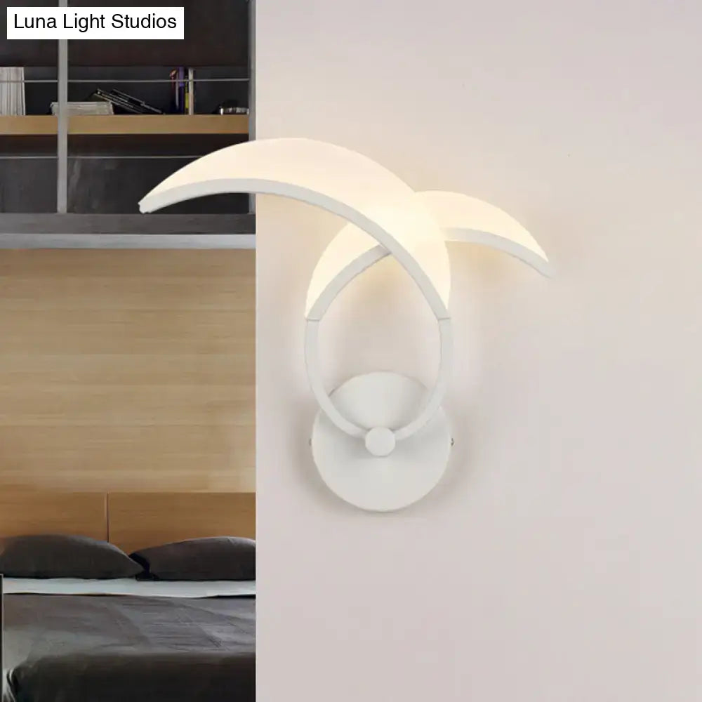 Minimalist led white double curved wall sconce with sleek arms and warm white light for bedroom use