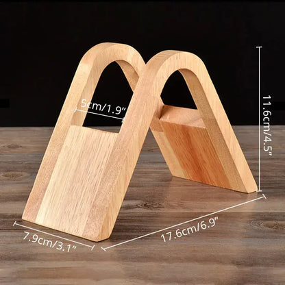 Light wood coffee filter holder with smooth natural grain finish and arched top design for minimalist kitchen use
