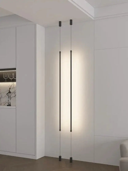 Modern minimalist matte black bedside pendant light with two slender vertical rods and warm straight strip glow