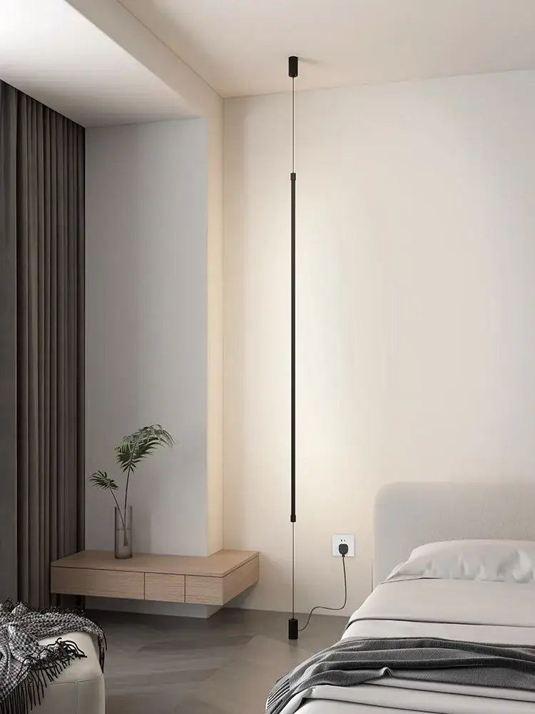 Minimalist matte black cylindrical pendant light with a sleek matte finish ideal as a pendant light strip for bedrooms