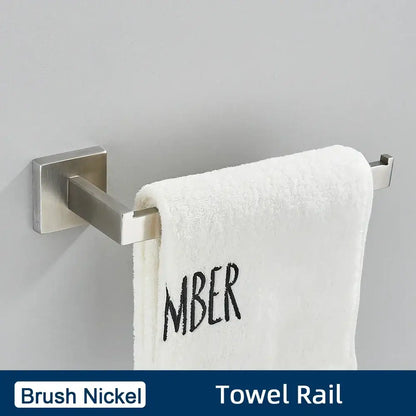 Brush nickel towel rail with white embroidered towel in a minimalist matte black stainless steel bathroom accessories set