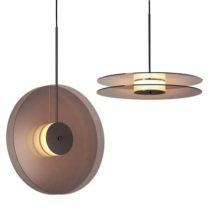 Minimalist matte glass pendant lights with translucent smoked glass shades and warm led illumination for dining rooms