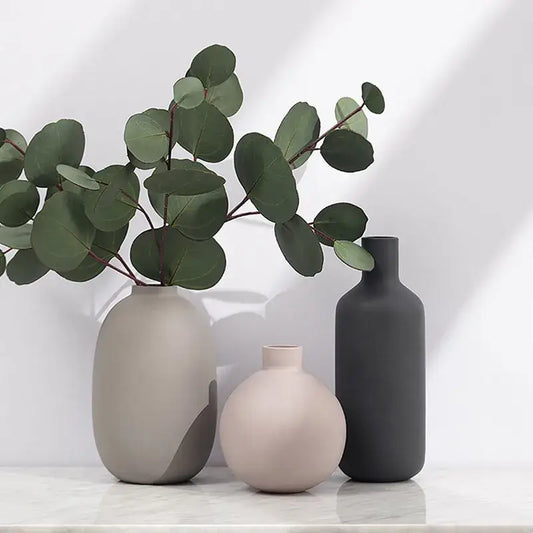 Minimalist matte pastel geometric ceramic vases in gray blush pink and charcoal for living room decorbites geometric decor
