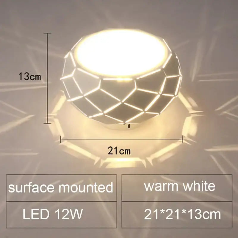 Minimalist metallic dimmable decorbites led ceiling light with geometric faceted design and warm white glow measuring 21cm by 13cm