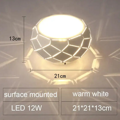 Minimalist metallic dimmable decorbites led ceiling light with geometric faceted design and warm white glow measuring 21cm by 13cm