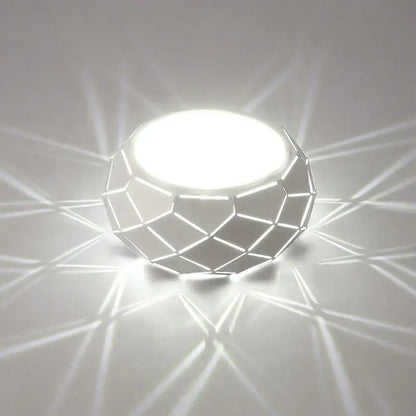 Minimalist geometric white led table lamp with faceted design casting sharp shadows for decorbites led ceiling light decor