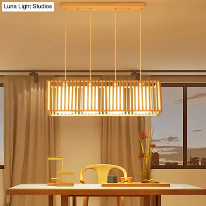 Decorbites asian wood island pendant light in natural wood finish with rectangular vertical slats and warm ambient glow