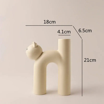Minimalist cream-colored ceramic decorbites cathead h-shaped tube vase with smooth matte finish for living room decor