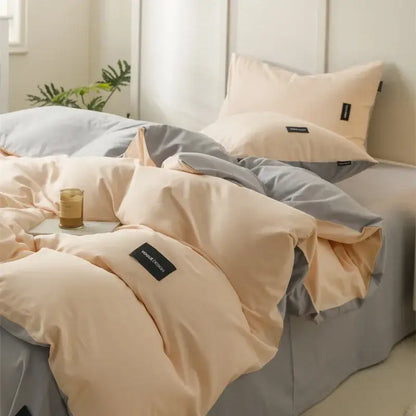 Beige and gray two-tone duvet bedding set with soft color matching cotton fabric and black woven labels for bedroom use