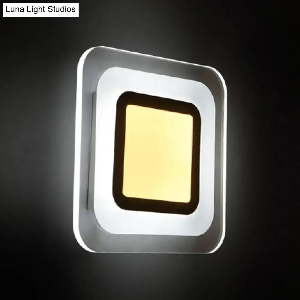 Minimalist off white square led wall lamp with sleek silver frame and warm yellow light in triangle round square design