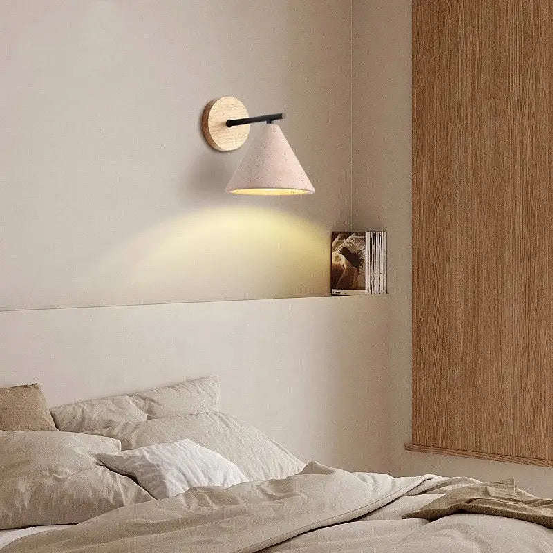 Minimalist pink concrete wall sconce with circular wooden backplate black metal arm and beige shade for bedroom decorbites iron yellow