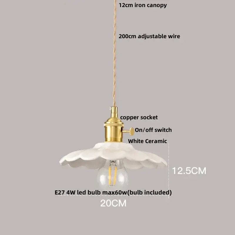 Minimalist white ceramic pendant light fixture with fluted petal design and brass copper socket for kitchen use