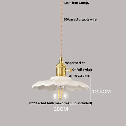 Minimalist white ceramic pendant light fixture with fluted petal design and brass copper socket for kitchen use