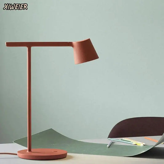 Minimalist terracotta desk lamp with adjustable nordic design and matte finish ideal for bedroom decorbites light