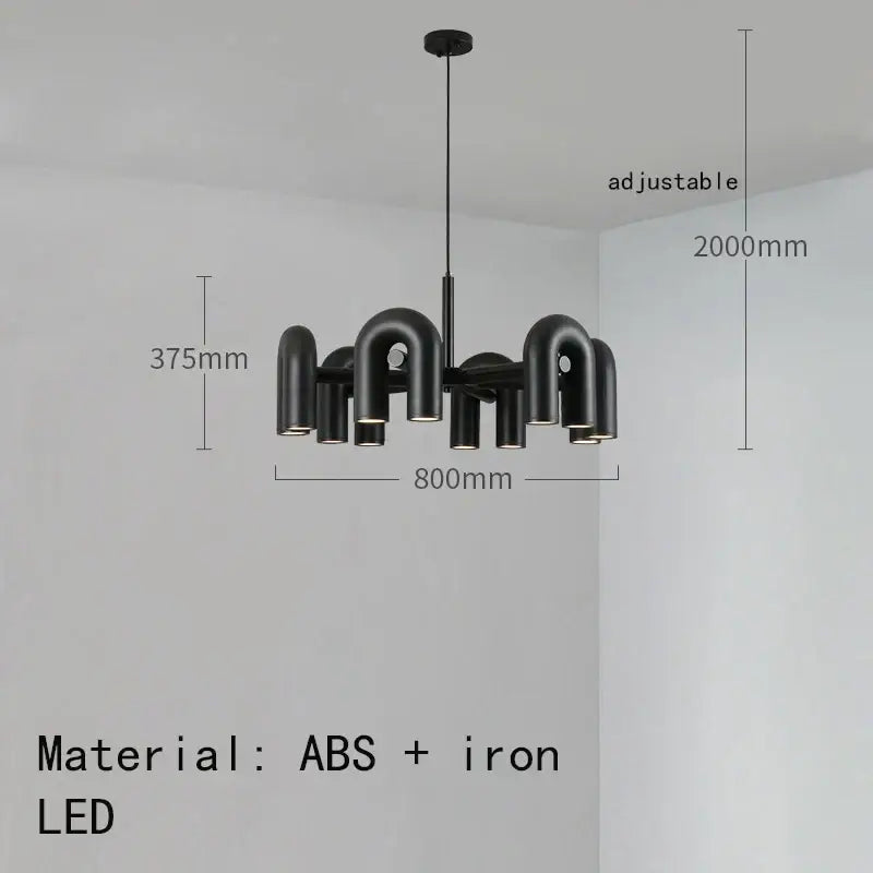 Black modern cirkus tube wall sconce with sleek u-shaped abs and iron design for minimalist bedroom reading light