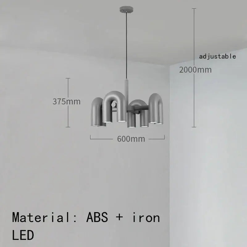 Modern silver-toned cirkus tube wall sconce with sleek industrial iron arms and curved abs for bedroom reading light