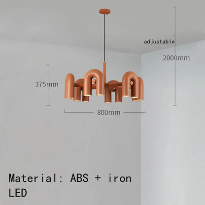 Copper-colored minimalist cirkus tube wall sconce with curved pipe arms made of abs and iron for bedroom reading light