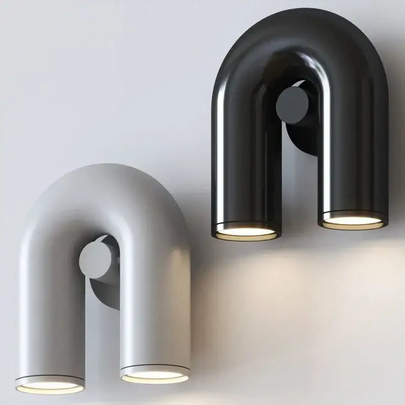 Minimalist terracotta cirkus tube wall sconce in matte black and silver with two cylindrical lights for bedroom reading