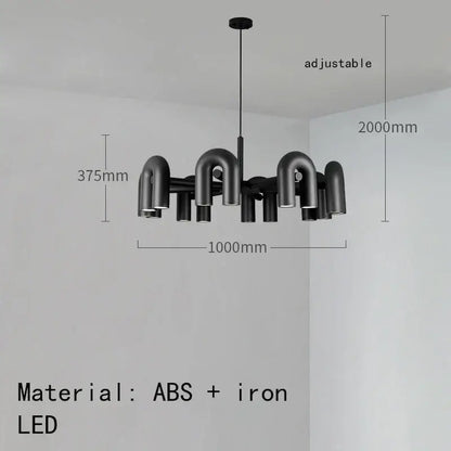 Black modern cirkus tube wall sconce with sleek u-shaped design made of abs and iron for minimalist bedroom lighting